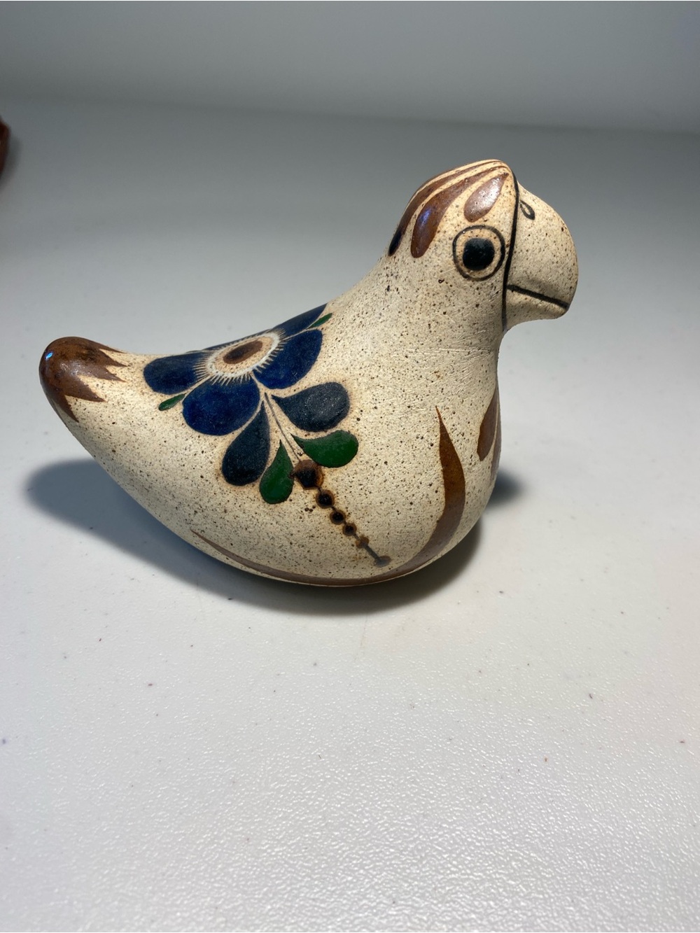 Handmade Ceramic Bird Figurine with Blue Floral Motif